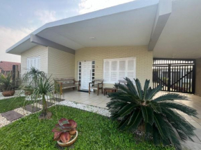 Casa com Piscina para 10 Pessoas em Xangri-Lá!